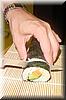 2002-08-28e Sushi - Cutting the roll.jpg